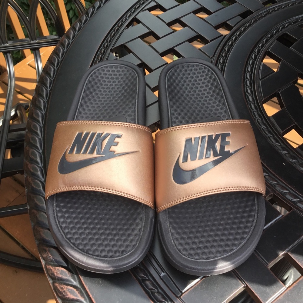 Rose gold Nike sandals